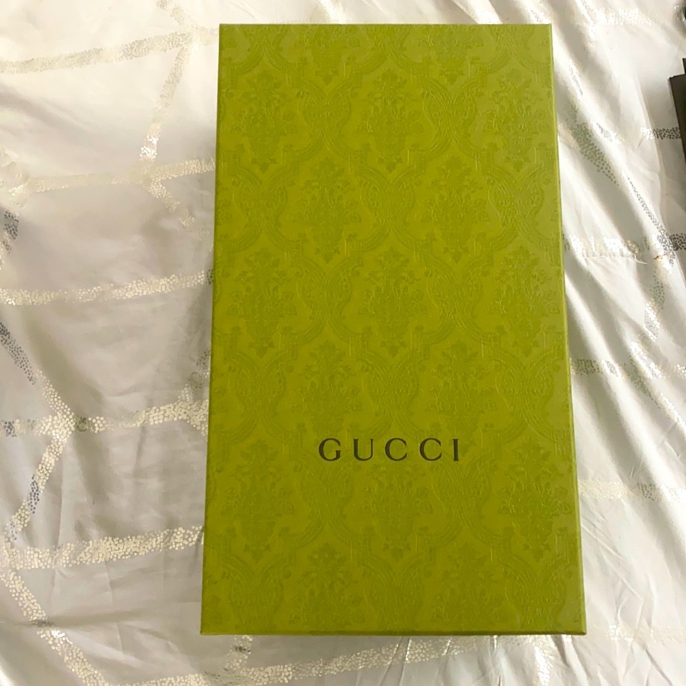 Several Gucci shoeboxes